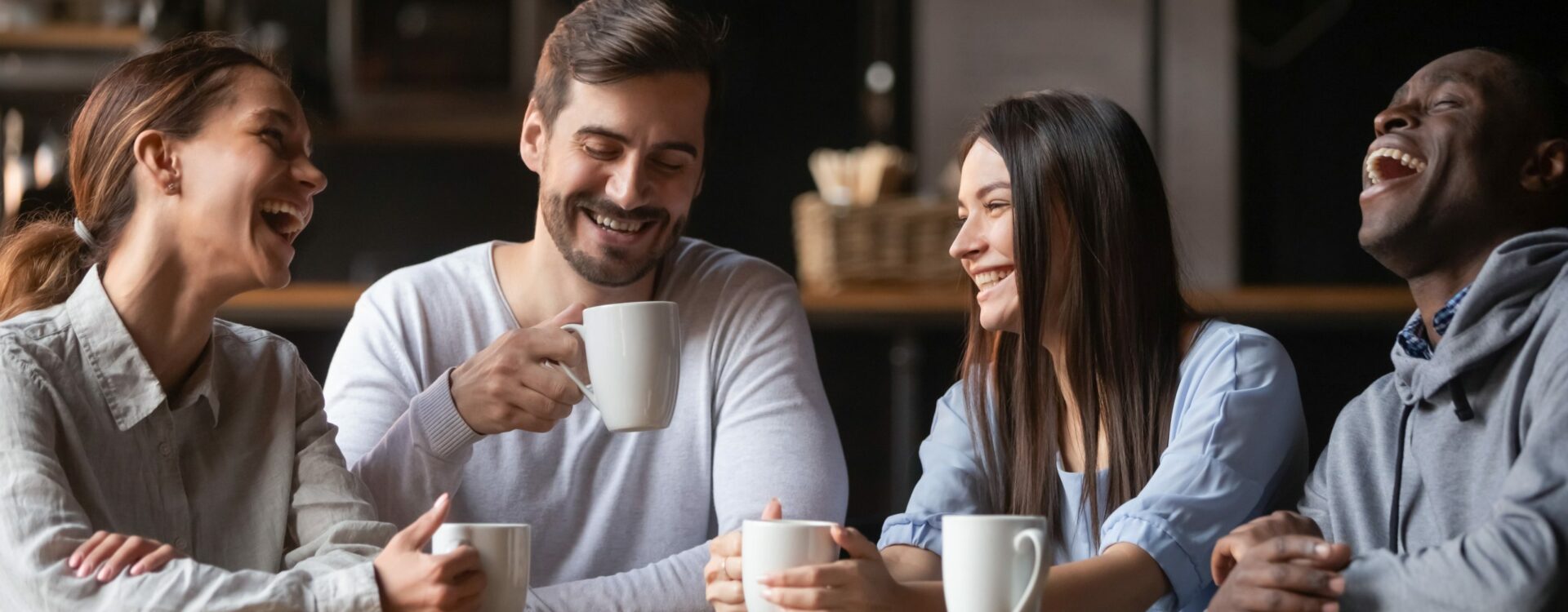Happy,Multiracial,Friends,Group,Laugh,Drink,Tea,In,Cafe,,Diverse